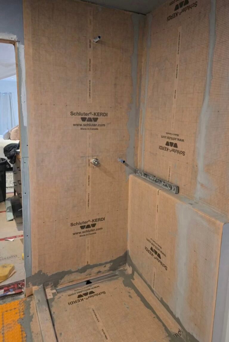 Schluter waterproofing system before shower tile installation